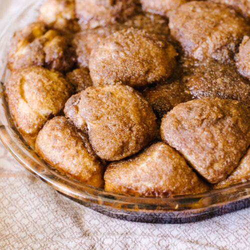 balls of dough sourdough monkey bread in glass pan